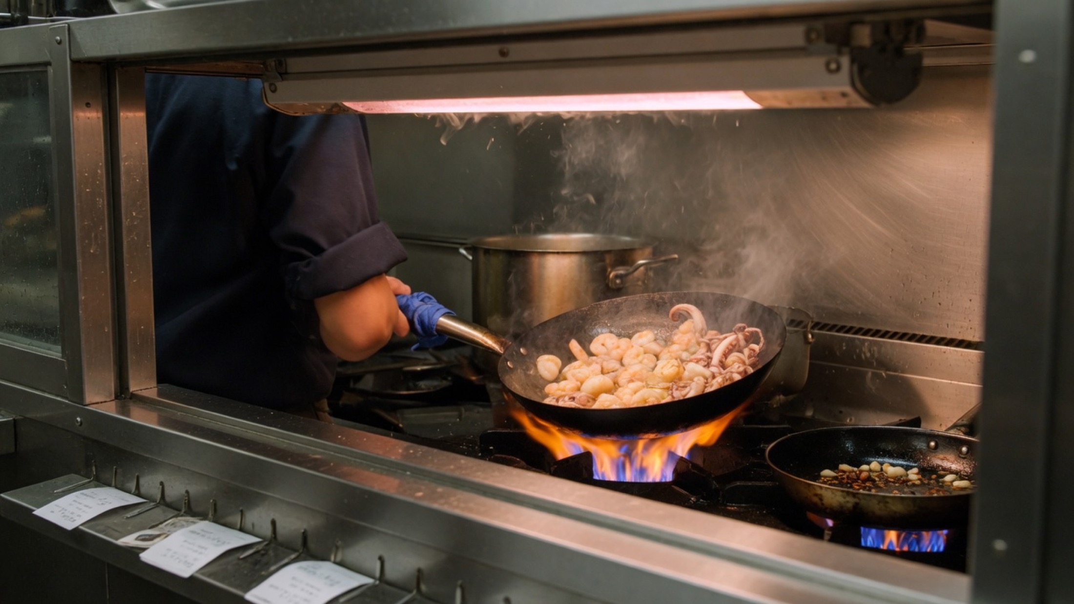 Seafood in flame, placeholder atmosphere for the fire